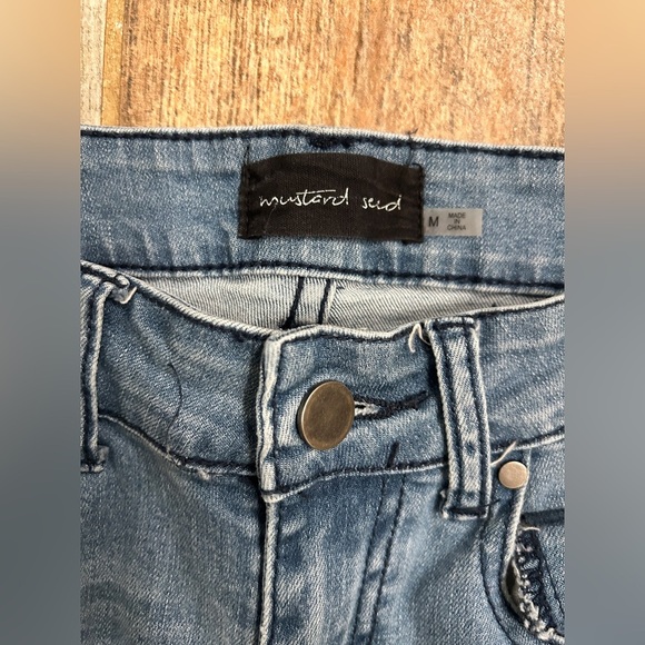 Mid-rise jeans with frayed hem and metallic detail on the side - Picture 4 of 10